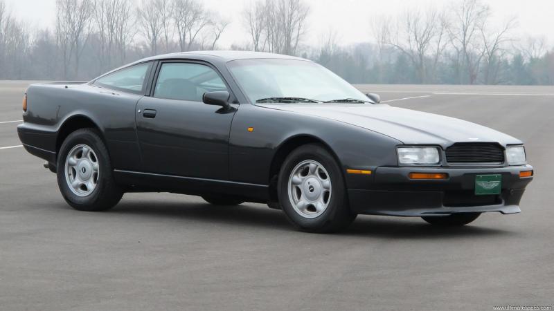 Black aston martin Virage with a nature background