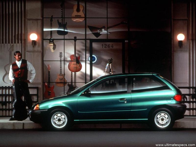 Green Geo Metro with person aside contemplating it